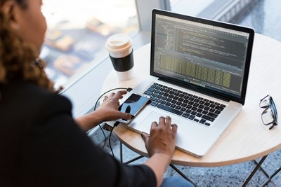 Woman working on laptop in a company in Mauritius